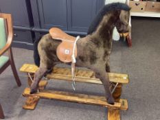 Mamas & Papas fabric rocking horse on safety stand, 110cm by 119cm.