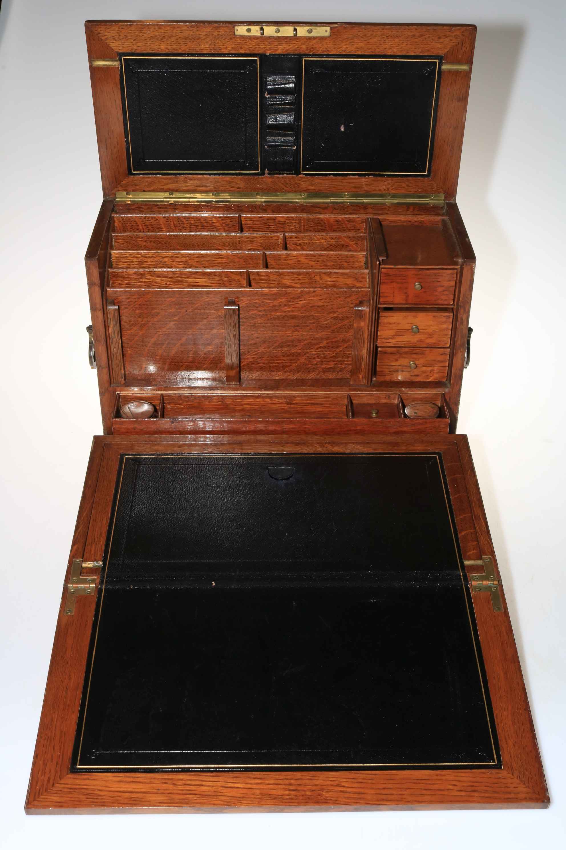 An early 20th Century oak fall front stationery cabinet, 28cm high. - Image 2 of 2