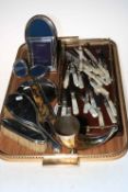 Silver backed brush set, four silver photograph frames, silver plate and mother of pearl flatware,