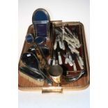 Silver backed brush set, four silver photograph frames, silver plate and mother of pearl flatware,