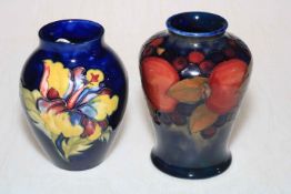 Moorcroft vase decorated with fruits on blue ground, 14cm high, with box,