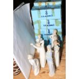 Eight Lladro figurines depicting children, with boxes.