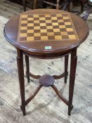 Edwardian circular mahogany chess top table, 70cm by 52cm diameter.