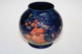 Moorcroft ovoid vase with finches design on blue ground, 19cm high.