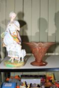 Large bisque figure of a shepherdess and an Art Nouveau peach glass vase.