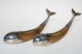 Two Continental silver mounted horn table posies in the form of fish, 27cm length.