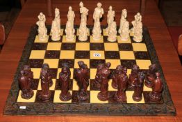 Ornate chess set with classical figure pieces.