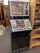 1970's Barcrest gaming machine, 171.5cm by 64cm by 56cm.