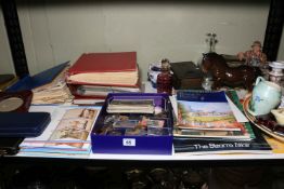 Collection of coins, albums of stamps and first day covers, cutlery, china, reference guides, etc.