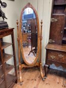 Reproduction painted frame oval bevelled cheval mirror, 171cm by 58cm.