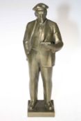 Cast metal figure of Vladimir Lenin.