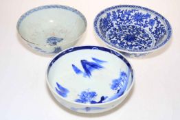 Three blue and white Oriental bowls.