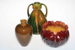 Bretby jardiniere, Burmantofts vase and similar three handled vase.