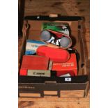 Box of various cameras and Ajax 10x50 binoculars with case.