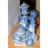 Collection of Wedgwood Blue Jasperware including two handled lidded vase, teapot, etc.