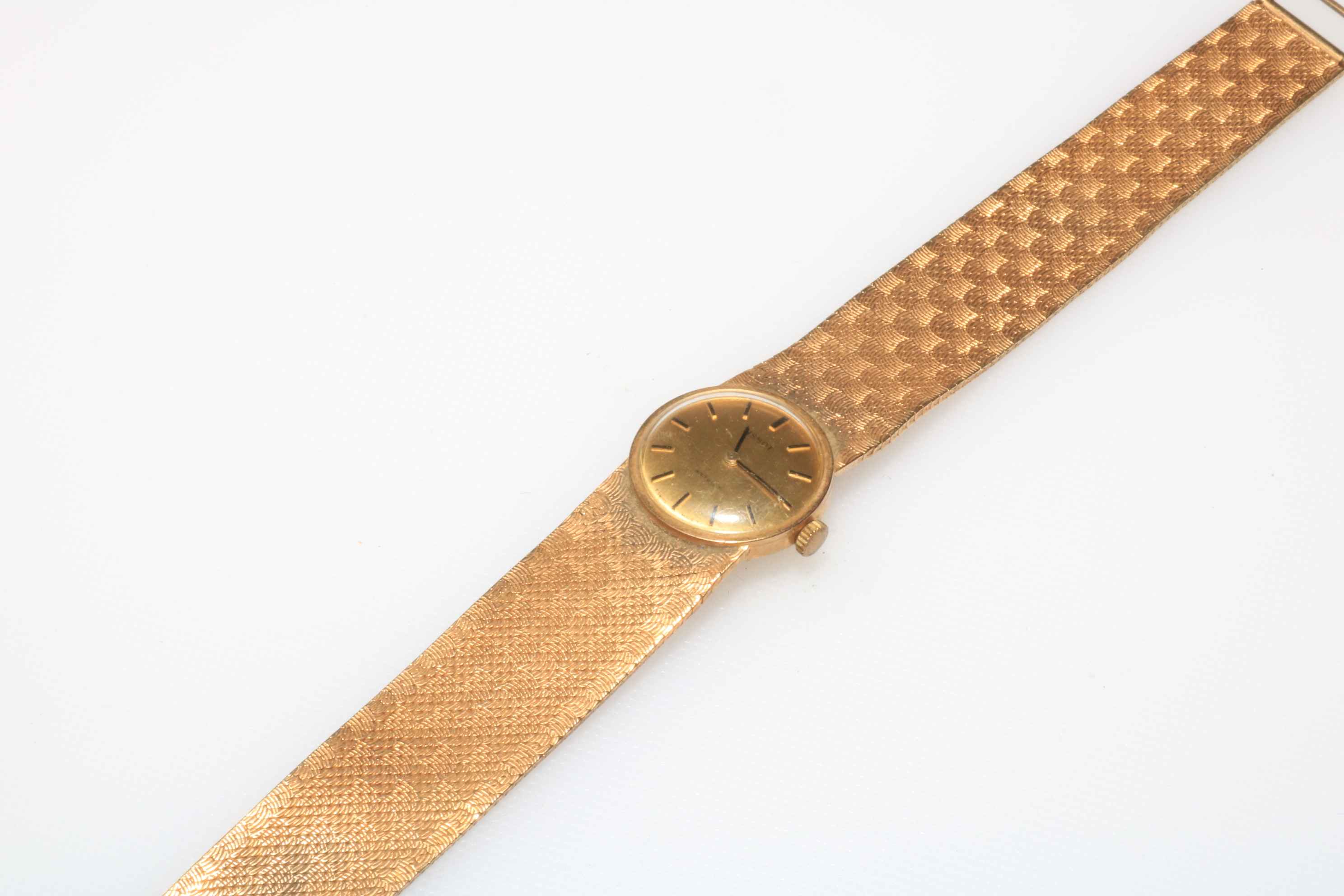 Tissot ladies 9 carat gold bracelet watch.