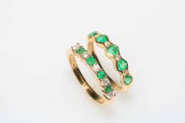 Two emerald and diamond 18 carat yellow gold rings.