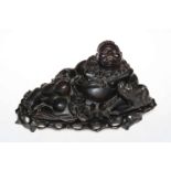 Ornate carved Oriental elder with boar, 20cm high.