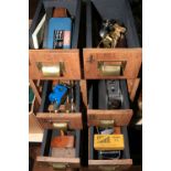 Small cabinet tool chest including small planes, spoke shaves and other tools.