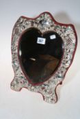 Large sterling silver mounted heart shaped boudoir easel mirror, 34cm by 29cm.
