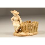 Royal Worcester figure, girl sitting on a tree stump at the edge of a Wicket fence, signed Hadley,