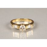 18 carat yellow gold diamond solitaire ring, set with a 0.75 carat brilliant cut diamond and a