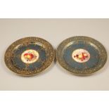 Pair Royal Worcester cabinet plates, blue ground with central hand painted panels of fruit signed