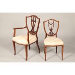 Set of four Edwardian inlaid mahogany shield back chairs, two carvers and two side chairs, inlaid