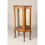 19th century serpentine fronted display cabinet, inlaid with flowers, with shaped glass side panels,