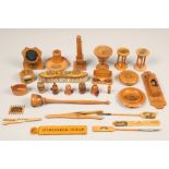 Twenty seven pieces of assorted Scottish sycamore Mauchline ware, including egg timers, pocket watch