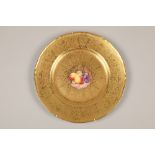 Royal Worcester cabinet plate, painted with a centre panel of fallen fruit within a tooled and