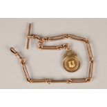9 carat rose gold trombone link short albert watch chain, with a 9 carat gold medal Weight 48g