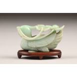 Chinese pale celadon jade carving of a Mandarin duck, holding a lotus stem in its bill with flower