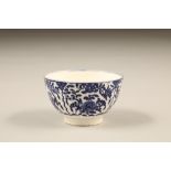 Small blue and white tea bowl, probably Worcester, floral decoration Diameter 8cm, height 5cm