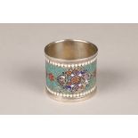 Early 20th century Russian silver and champlevé enamel napkin ring, makers mark worn, decorated with
