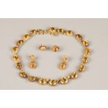 Ladies 9 carat gold mounted citrine necklace, mounted with twenty citrines, together with two
