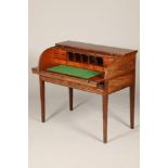 Mahogany roll top desk, with fitted interior and pull out drawer, with two fitted drawers on