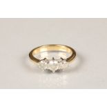 Ladies 18 carat three stone diamond ring, yellow gold with a centre 0.33 carat diamond flanked