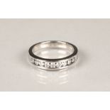 Platinum diamond set eternity ring, platinum band with 9 brilliant cut diamonds, ring size O/P