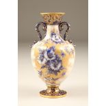 Carltonware double handled vase, baluster form, blue and white decorated with petunia flowers,