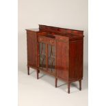 Edwardian inlaid mahogany bookcase, with fitted drawer, over pair of glazed doors, flanked by a pair