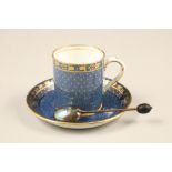 Boxed set of six porcelain coffee cups and saucers, decorated with blue background and gilt