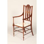 Edwardian finely framed inlaid mahogany carved chair, raised on turned legs