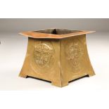 Arts and Crafts brass square tapered planter, decorated with circular panels embossed with