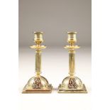 Pair of 19th century brass candlesticks, with boulle decorations, set on square bases with brass and