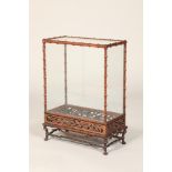 Chinese miniature glass display case, with carved faux bamboo effect mounts Length 41cm, Depth 20.