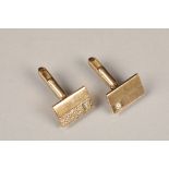 Pair gents 9 carat gold cufflinks, rectangular form, each set with a single brilliant cut diamond.