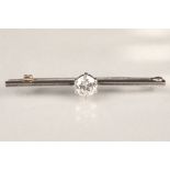 18 carat white gold bar brooch, set with a 0.5 carat brilliant cut diamond Weight 4.5g Length 46mm