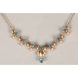 Ladies 9 carat gold aqua marine and pearl seed necklace, seven round brilliant cut aquamarines set