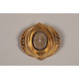 Victorian unmarked gold mourning brooch, set with a central single old cut diamond 42mm x 40mm